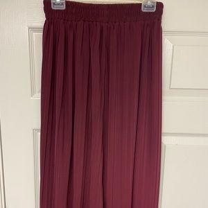 Women’s burgundy pleated skirt